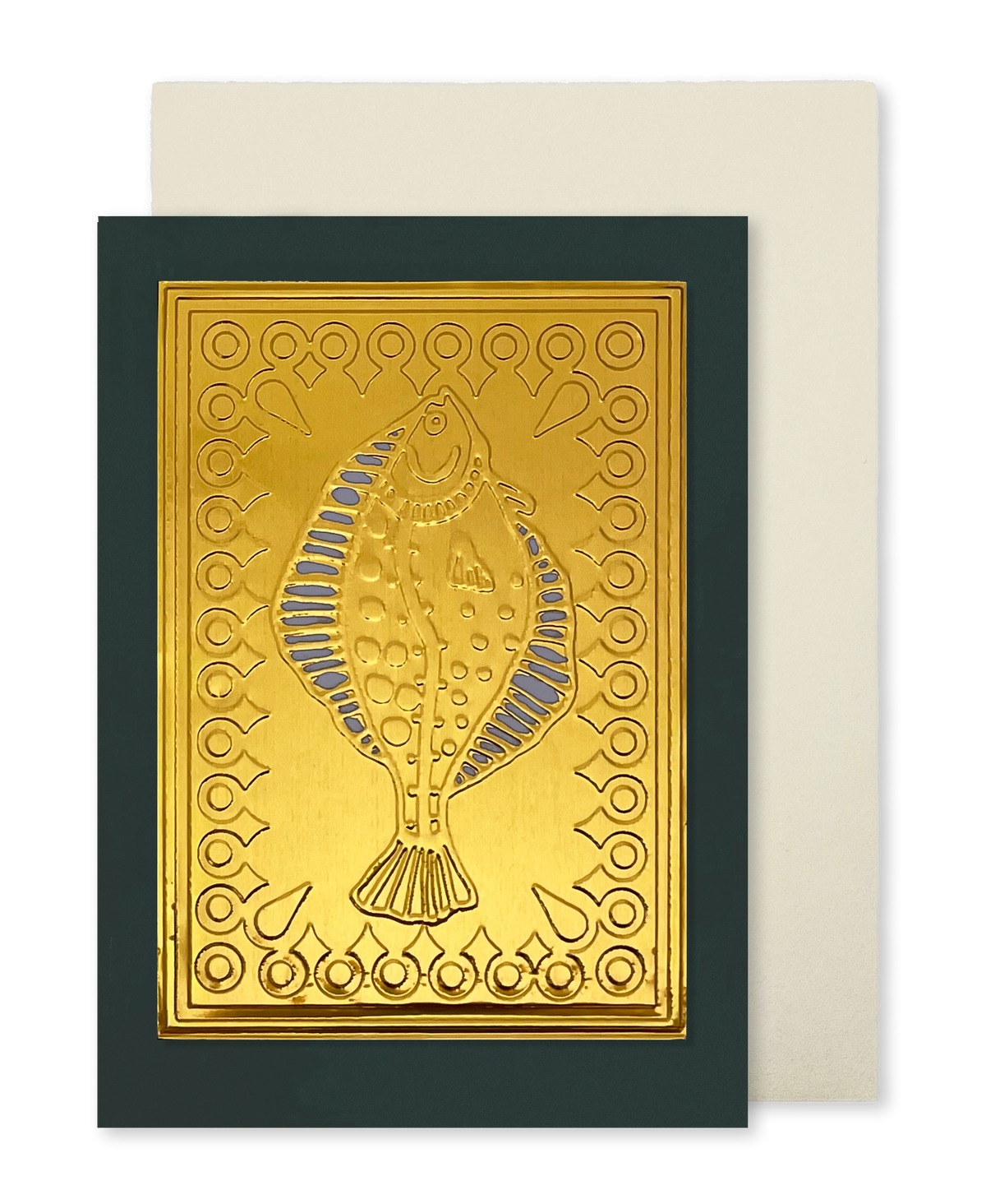 A greeting card by fabler's Press with a raised gold fish design on dark green card stock, shown with a plain off-white envelope behind it on a white background.