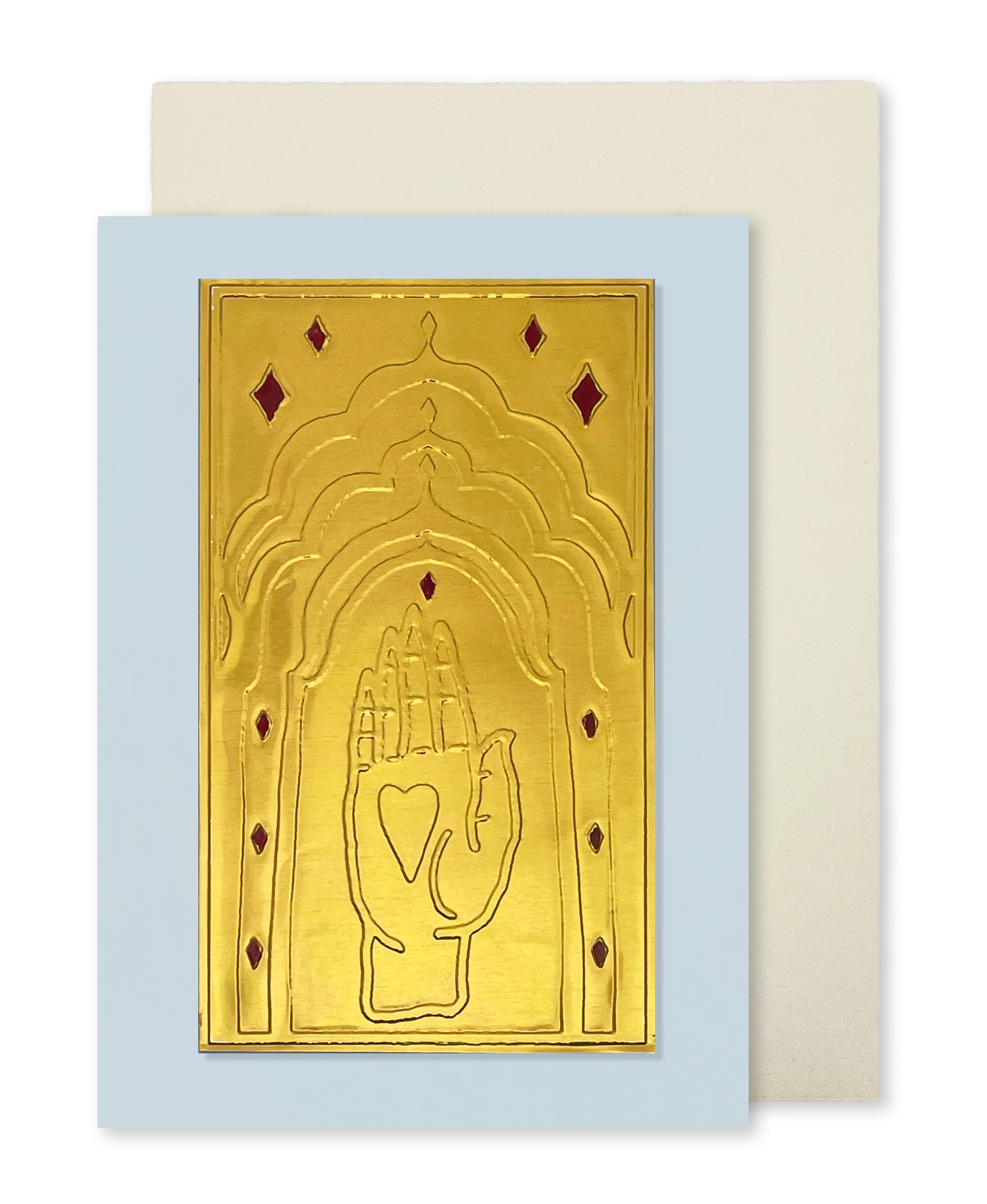 A greeting card by fabler's Press with a raised gold hand design on a muted blue cards tock, shown with a plain off-white envelope behind it on a white background.