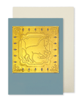 A greeting card with a dusty blue cover featuring an embossed gold horse design, shown with a cream envelope behind it on a white background.