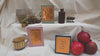 Large full page video of Fabler's Press greeting card being made. showing details of handling, painting on the embossed foil and the cards amongst other objects like old pots, grapes and pomegranates. 